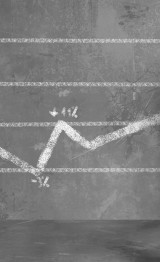 Businessman draws a statistical trend line